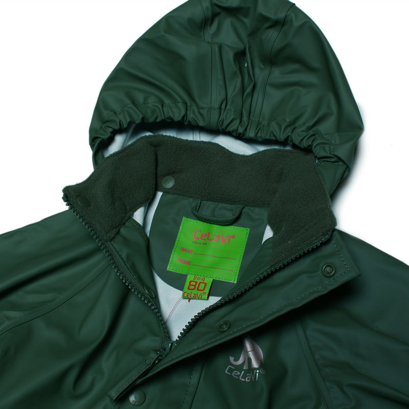 Close-up of hood on kids’ waterproof rain jacket in dark pine green.