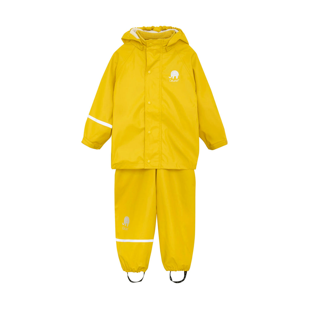 Flat lay of waterproof rain jacket and pants set for kids in yellow